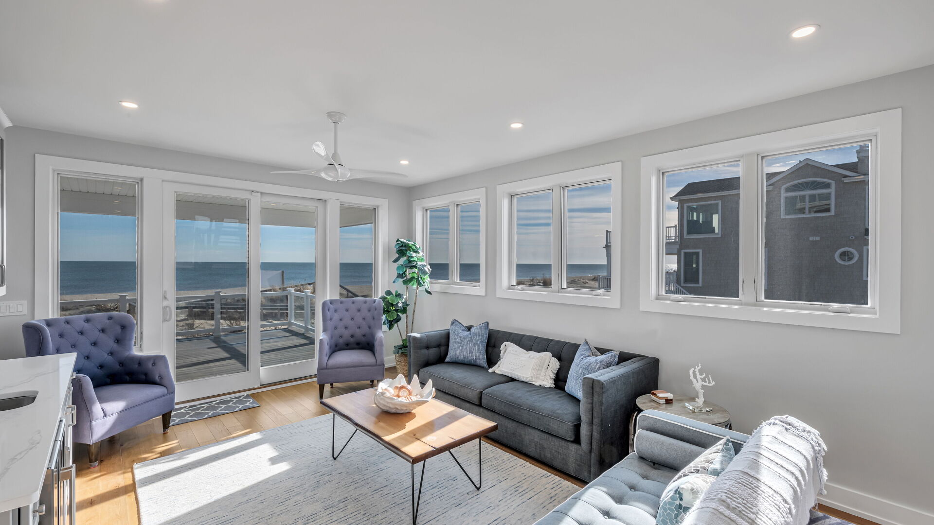 living room fireplace oceanfront view
