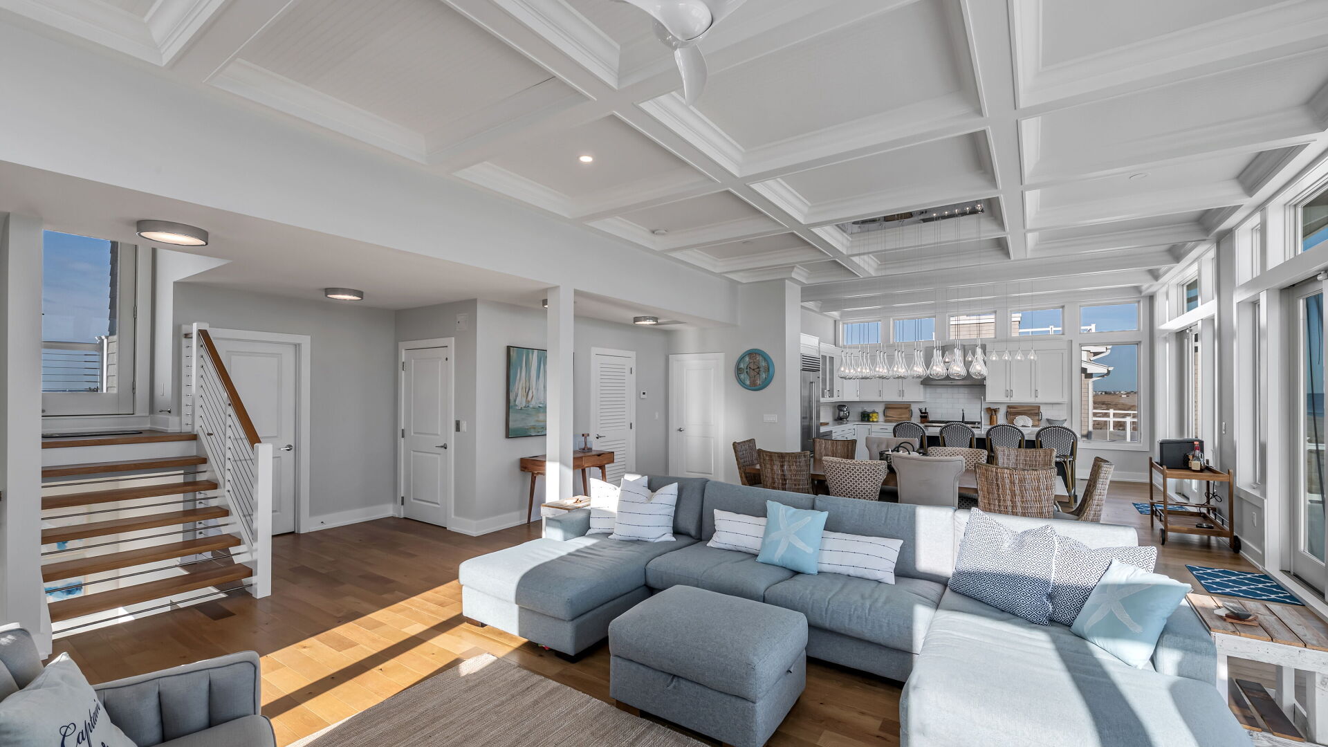 open concept living dining kitchen